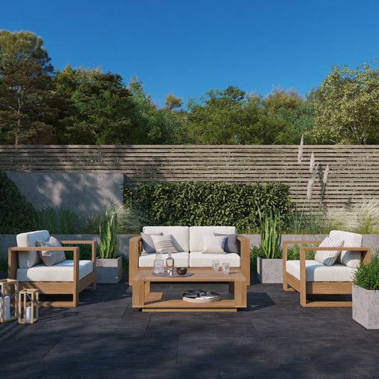 Basel outdoor sofa and lounge chair set in oiled eucalyptus, styled on a deck — Highbury Furnishings