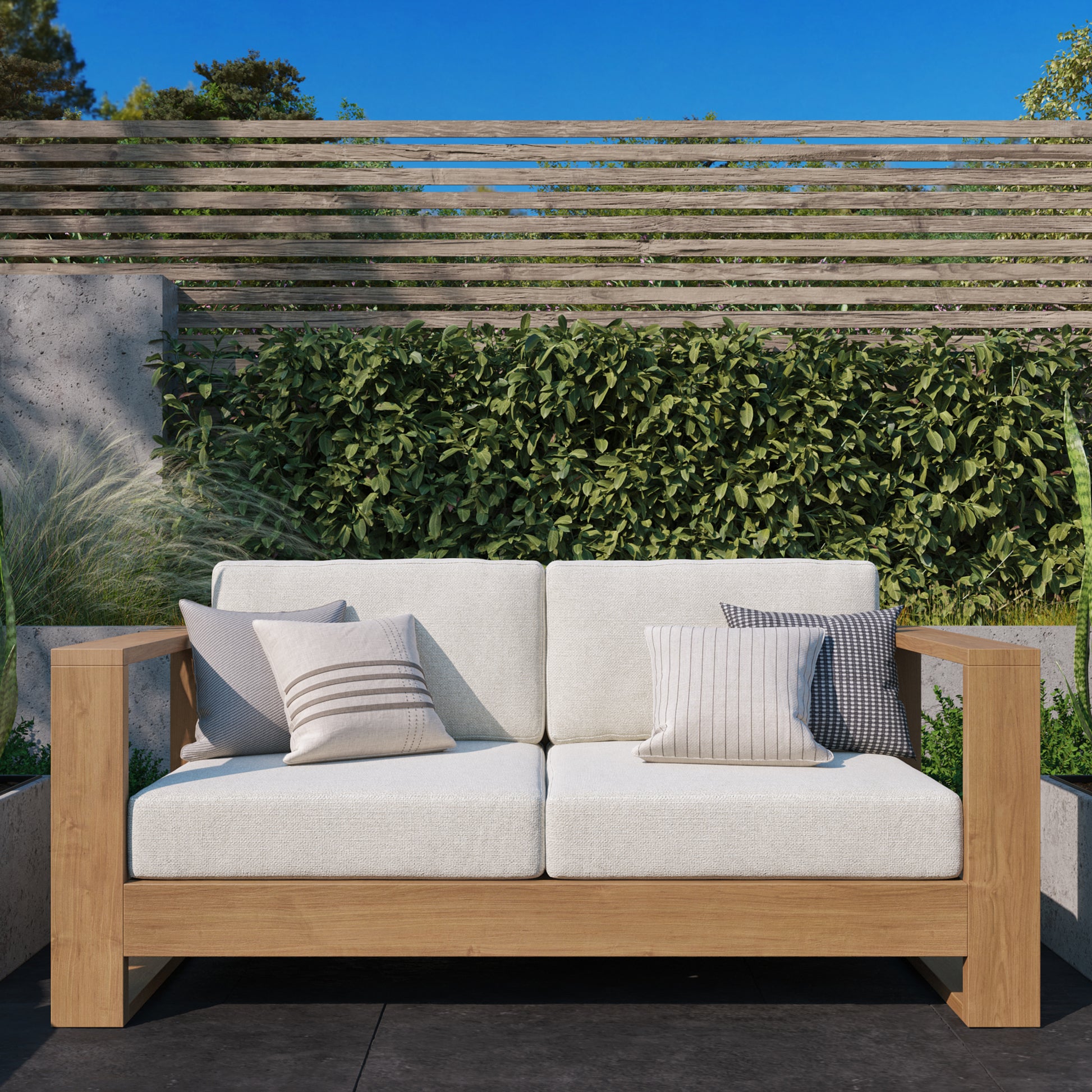 Basel 68-inch oiled eucalyptus outdoor sofa on a modern patio — Highbury Furnishings